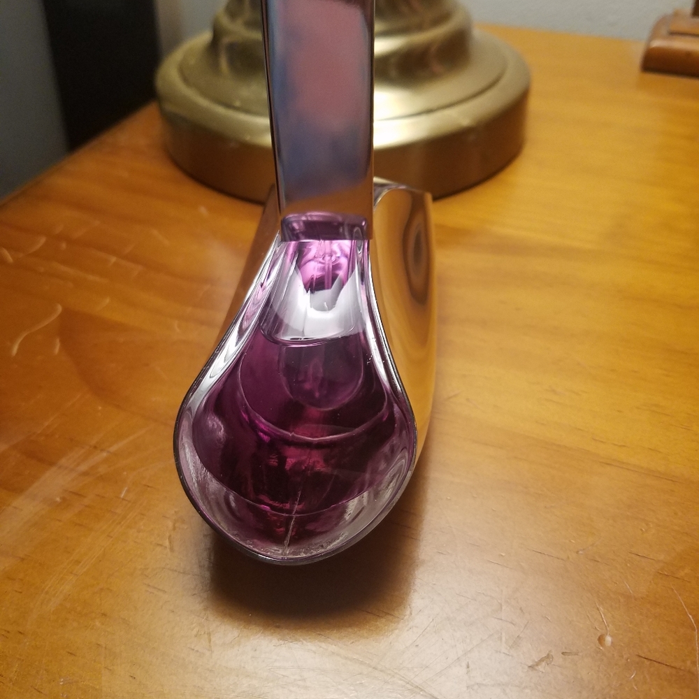Large bottle of euphoria perfume by Calvin Klein for women.